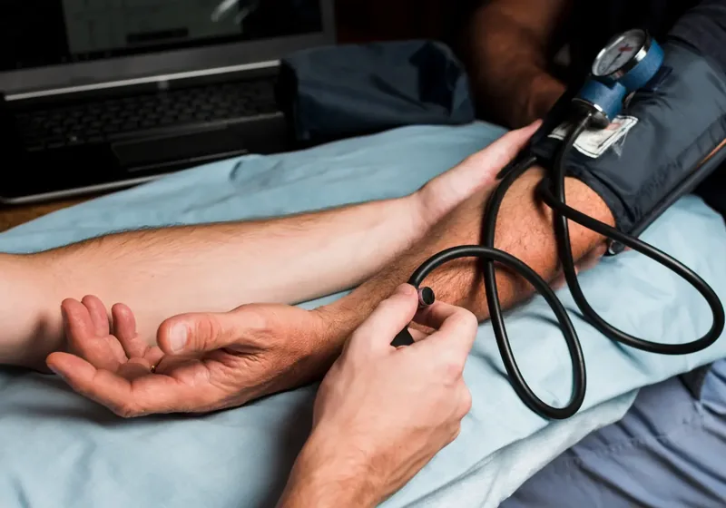Patient training with a blood flow restriction cuff on the thigh